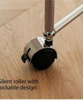 Close-up of smooth universal caster for Compact Rolling Home Office Desk Featuring Smooth Universal Casters And Built In Keyboard Shelf.