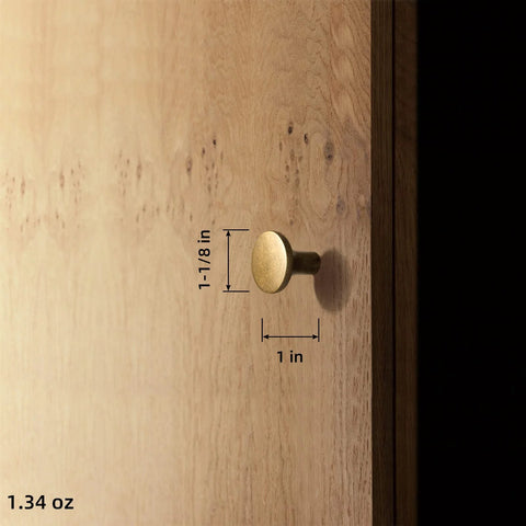 Antique Brass Cabinet Knobs 6 Pack Minimalist Round Hardware For Cabinets And Dressers 1-1/8 Inch Diameter installed on wood