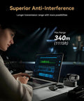 Person using Lark Max 2 Wireless Microphone System For iPhone And Cameras With AI Noise Cancel 32Bit Full Chain Audio at desk
