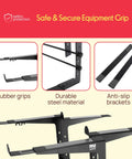 Close-up of Dual Laptop Stand with Adjustable Height, showing anti-slip prongs, rubber grips, and durable steel material for stability.
