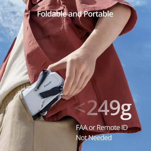Person holding Atom 3 Axis Gimbal 4K GPS Drone under 249g, fits in pocket, highlighting foldable and portable design.