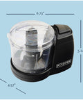 Mini Electric Food Chopper With 2 Cup Capacity One Touch Operation in black with dimensions labeled on a light blue background.