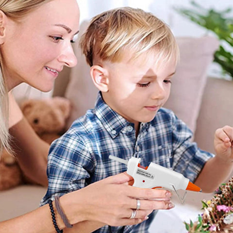 Parent and child using Eight Piece Mini Hot Glue Gun Kit For Crafts And DIY Projects Multicolor 20 Watt Glue Guns for crafts