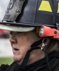 Firefighter wearing helmet with Firefighter LED Helmet Light With 180 Degree Articulating Head And Dual Beam Output, Orange