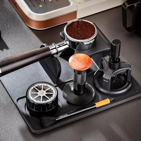 Daily Driver Barista Coffee Accessories Set Featuring Calibrated Spring Tamper Stirring Needle And Distribution Tool For Truly Smooth Espresso Pulls At Home displayed on a black tray with tools and coffee grounds.