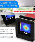 USB Powered AMG8833 Infrared Thermal Imager 8x8 Sensor Array With Housing for Easy Electronics Inspections, shown on display.