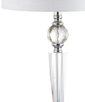 Close-up of Clear Crystal Table Lamp Set Of 2, 29 And A Half Inch Tall Modern Glam Candlestick Lamps with Chrome Bases and White Linen Drum Shades.