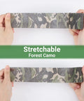 Hands stretching camouflage grip tape, showing flexibility. Product: Camouflage Grip Tape 4 Roll Pack Self Adhesive Fabric.