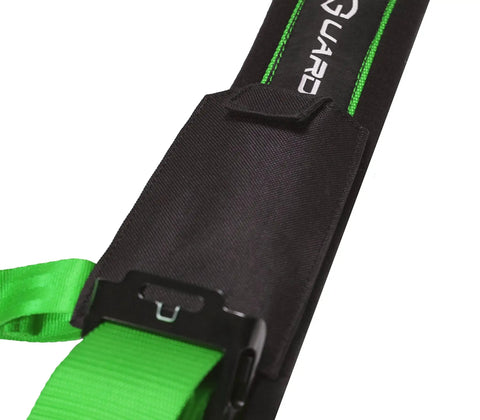 Close-up of the green 4 point harness with 2 inch straps for UTV off road universal fit, featuring a quick release buckle.