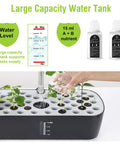 Indoor Hydroponics Garden System With 52 Pods, Smart Led Grow Light, Large Water Tank, Adjustable Height, Auto Timer And Quiet Pump For Year Round Herbs Veggies And Flowers In Your Kitchen Or Office showing large capacity water tank with seedlings.
