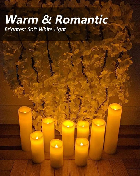 Flameless LED Candle Set Of 10 Pillar Candles Waterproof Resin For Indoor Outdoor Use Ivory With Realistic Flickering Flame And Warm Yellow Glow Battery Operated Heights 4 5 6 7 Inches arranged in front of flowers
