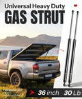 Two Pack 36 Inch Gas Struts 30 Lb Lift Supports For Tonneau Covers and truck shown in grass field