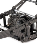 Close-up of Carbon Fiber Lunatic Sporty Chassis Kit With OD3 Overdrive Transmission showing carbon frame detail and gear assembly.