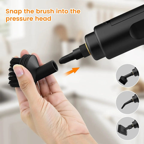 Hand holding black brush attachment for 18 Piece Top Shelf Steam Cleaner Accessory Kit, designed for versatile cleaning tasks.