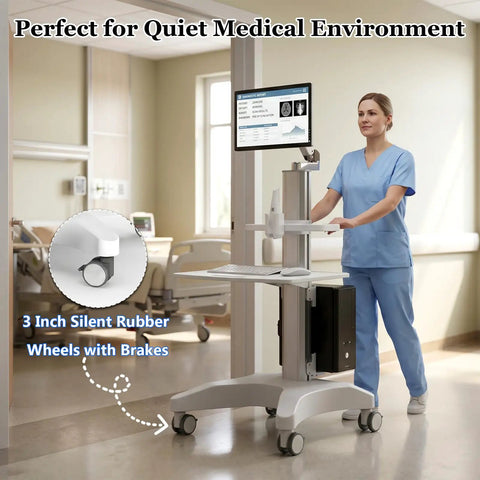 Adjustable Height Rolling Standing Desk With Rock Solid Monitor Mount And Smooth Keyboard Tray in a medical setting with a user.