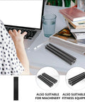 Two Pack Black Aluminum Linear Rail Extrusion Guide With Anodized Finish on desk with books, laptop, and glass