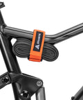 Rockband Bicycle Gear Carrier Strap In Orange No Drop Mount For Inner Tubes And Tools Secure Frame Attachment on bike