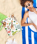 Waterproof Wet Bag For Swimwear And Baby Cloth Diapers Travel Beach Pool Gear on sand with animal print