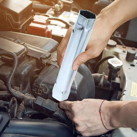 Premium Steel Water Heater Element Socket Wrench For RV Trailers And Campers With Ergonomic Tubular Handle compactly held over engine work.