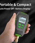 Super Stars digital vacuum gauge handheld with gray body and green accents, 1/4 inch SAE fitting, LCD display