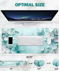 Dope Large 4 In 1 Mouse Pad Desk Pad Set With Keyboard And Mouse Wrist Rests XXL 35 By 15 Inch Non Slip Base Stitched Edges Teal Butterfly Design Includes Cup Coaster For Home Office, showing top view with floral and butterfly print.