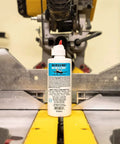 Pro Grade Heavy Duty Multi Use Liquid High Performance Industrial Lubricant For Minimum Quantity Lubrication MQL In Machining And Cutting Tool Applications, Delivers Fine Droplets Or Spray To Reduce Friction At The Edge, Clear 4 Oz Drop Bottle in industrial setting.
