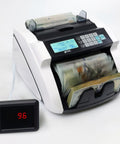High Speed Money Counter With Multi Currency Detection, Counterfeit Bill Detector showing LCD Display and processed bills