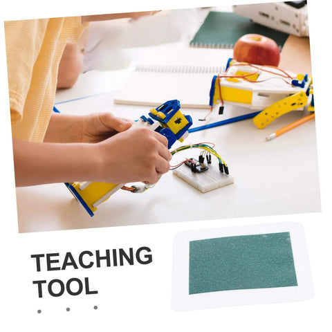 Magnetic Flux Display Sheet Reusable Magnetic Viewing Film For Educational Projects on a classroom desk with teaching tools