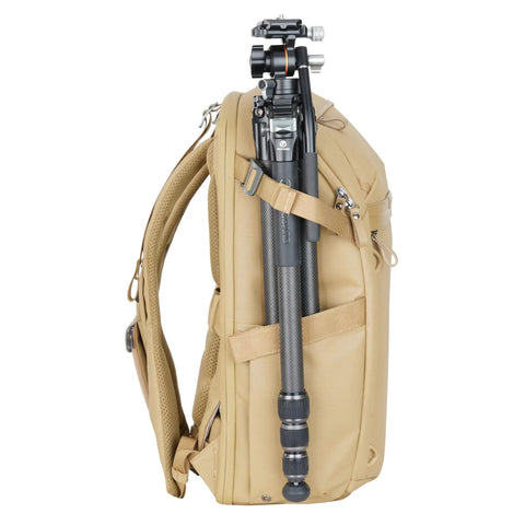 Side view of Metro B30L 30L Camera Backpack With Convertible Daypack in Beige, tripod attached, travel ready carry on for creators on the go.