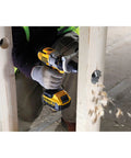 Worker using Workhorse Self Feed Spade Drill Bit For Tough Job Sites And 28 Millimeter Aggressive Cutters With Lockdown Shank on timber.