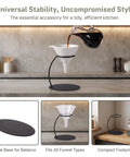 Heavy Duty Coffee Filter Holder Funnel Stand With Slick Black Iron Base For Hands Free Drip Pour Over Brewing, coffee pouring in action.