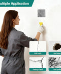 Person using Drywall Repair Kit For Large Holes And Damaged Walls 25 Piece Patch Set With Scrapers Sandpaper And Gloves Includes 2x3 4x7 6x6 8x4 Inch Patches Quick Fix For Ceiling And Bathroom Walls