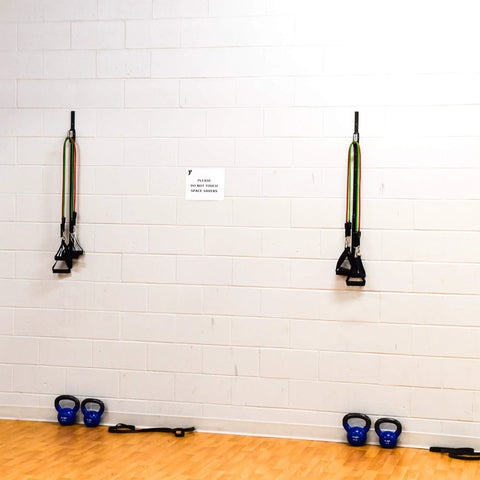 Premium Space Saver Gym Mount With One Steel Rail And One Quick Slide Car To Dominate Your Daily Grind Durable wall anchor with resistance bands.