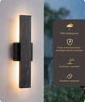 Top Shelf Led Outdoor Wall Lights Modern Black Finish adjustable with backlight, IP65 rated, in rainy outdoor setting.