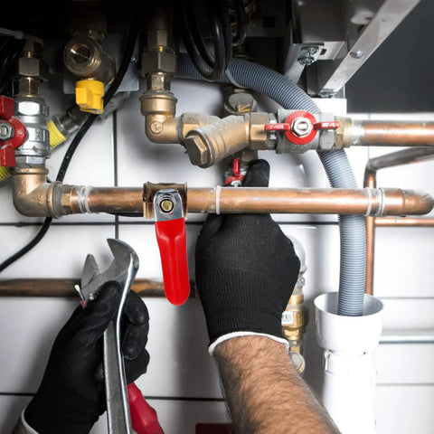 Kickass 2Pcs Copper Ball Valve 6MM Fittings With Red Handle installed in plumbing, hand using wrench on copper tubing.
