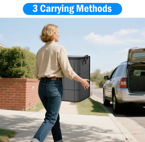 Person carrying Oversized 160L Storage Bag Organizer Waterproof Non Woven With Double Zippers And Reinforced Handles