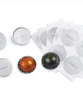 Reusable Aluminum Foil Seal Lids For Nespresso VertuoLine Capsules 240 Pcs Eco Friendly Refill Kit with assorted foil lids on display