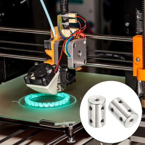 3D printer in action beside Stainless Steel Shaft Coupler Connector L22 X D14 6mm To 8mm Bore Rigid Coupling Silver 4 Pack