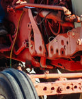 Tractor fitted with Heavy Duty Lynch Pin Assortment Kit with zinc plated ring locking pins 8x45mm for trailers and towing accessories.