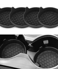 SINGARO silicone car cup holder coasters, 4-pack, black; non-slip honeycomb inserts shown installed in vehicle cup holders