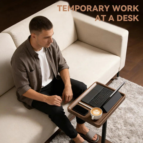 Person working on laptop with Slim C Shaped End Table With Adjustable Height And 360 Degree Swivel Mobile Laptop Desk in living room