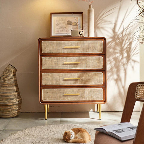 Wooden dresser with golden handles, light decorative items and sunlight streaming, featuring woven texture and 3 inch solid brass cabinet pulls.