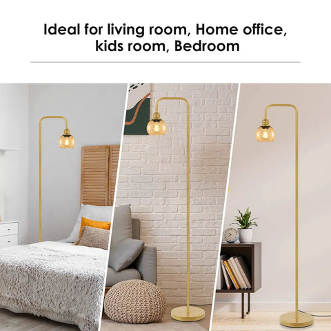 Modern Floor Lamp With Amber Glass Globe Shade And 6W LED Bulb in bedroom, living room, home office setting, brass gold finish