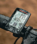 Padrone Digital Bluetooth Cycling Computer With IPX8 Waterproof Build mounted on bike handlebar, showing speed and cadence.