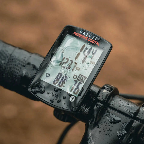 Padrone Digital Bluetooth Cycling Computer With IPX8 Waterproof Build mounted on bike handlebar, showing speed and cadence.