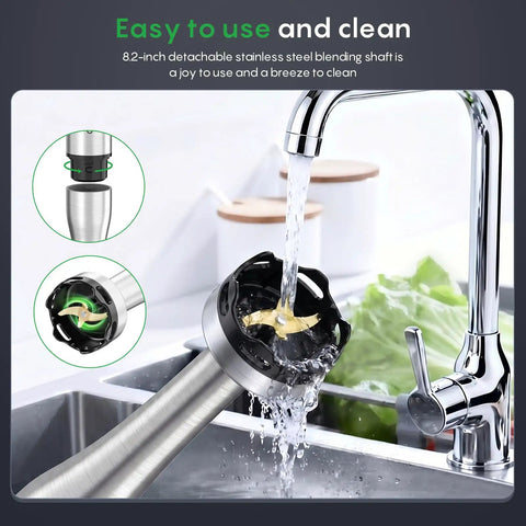 Top Tier Four In One Immersion Hand Blender With Variable Speed Trigger being rinsed under a faucet, showcasing its detachable stainless steel shaft.