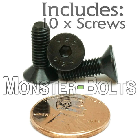 Hella Tough M5 x 15mm Flat Head Socket Cap Screws DIN 7991 Metric Hardware Class 12.9 with a penny for size comparison.