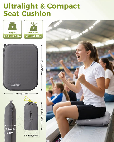 Go-To Self-Inflating Seat Cushion For Travel And Outdoors on stadium bleacher, grey, 15x11x2 in, user seated comfortably