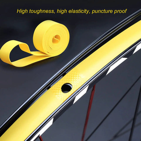 2 Pack PVC Rim Tape for 26 Inch Mountain Bikes High Elasticity Puncture Proof Inner Tube Protector shown on bike wheel