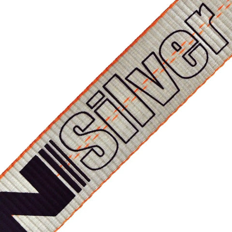 Close-up of Silver Series webbing from Beefy Ratchet Straps With Wire Hooks 2 Inch By 15 Foot 4 Pack Silver Series Heavy Duty Tie Downs.